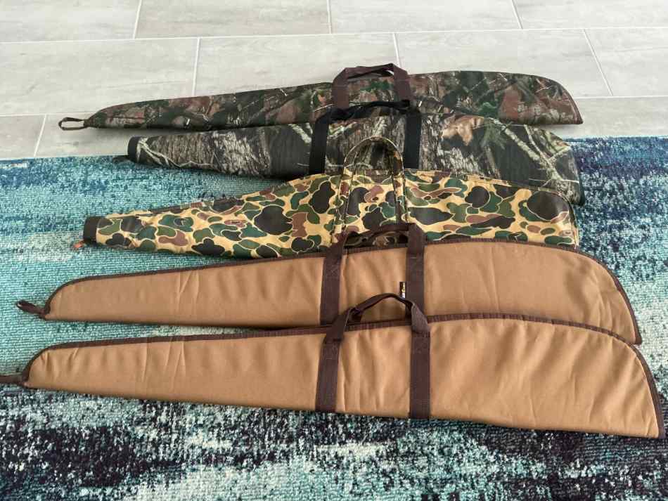 Five various rifle scabbards
